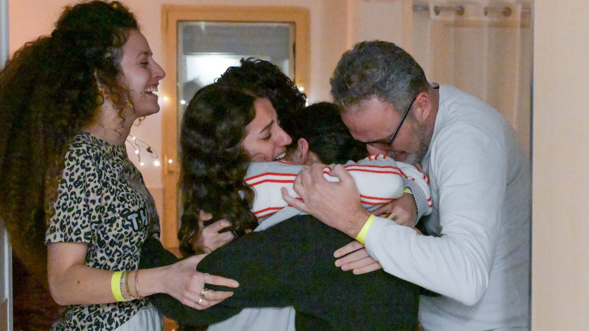 Romi Gonen is warmly embraced by her family following her release from Gaza by Hamas terrorists as part of the cease-fire deal.