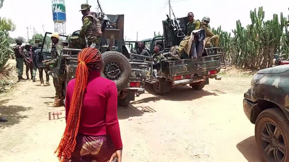 Nigerian military in vehicles