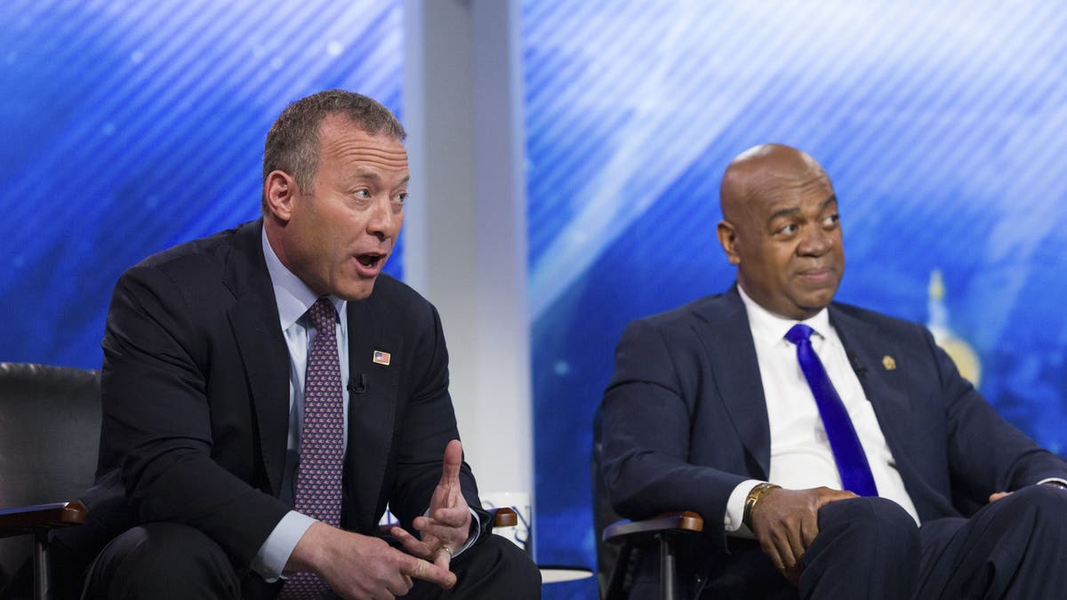 Ras Baraka, right, with Rep. Josh Gottheimer at debate