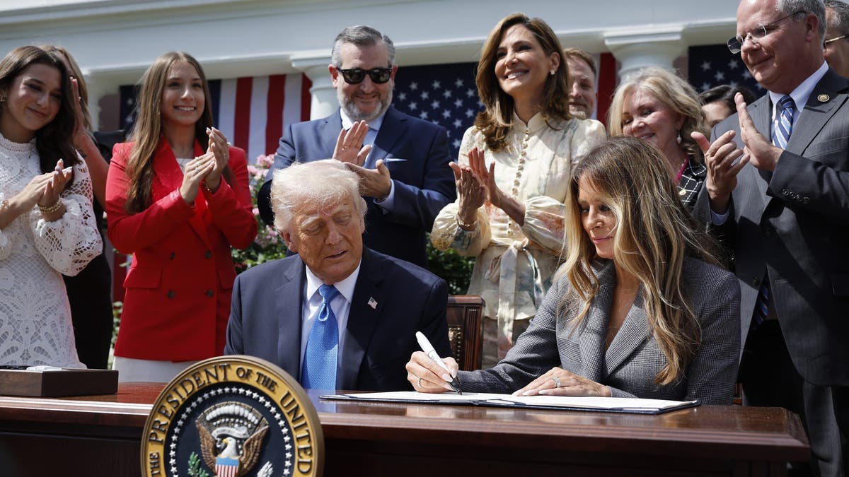 Trump and First Lady Melania Trump at the Take It Down Act signing ceremony Monday.