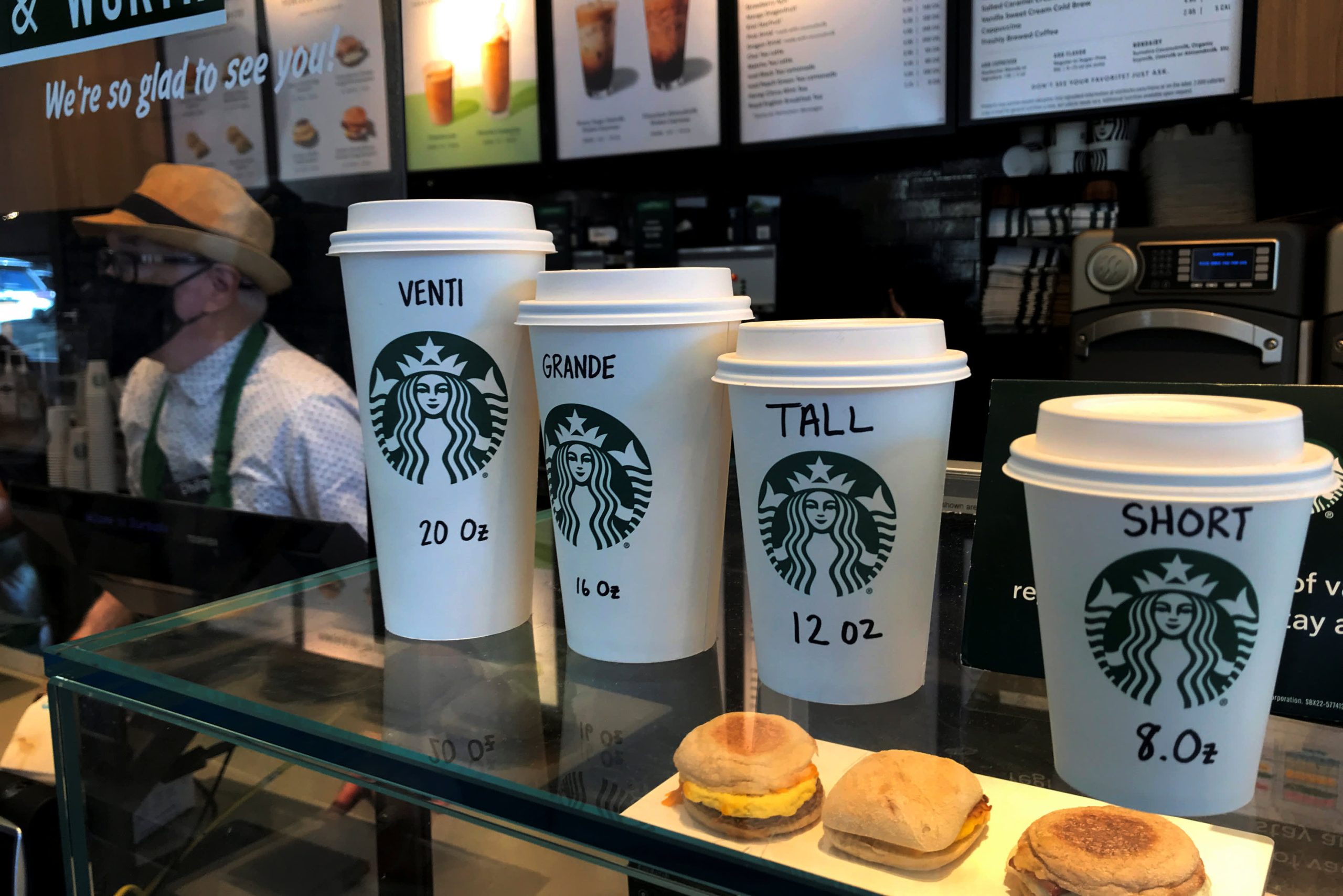 Starbucks shares slide after coffee chain says sales fell again, suspends outlook