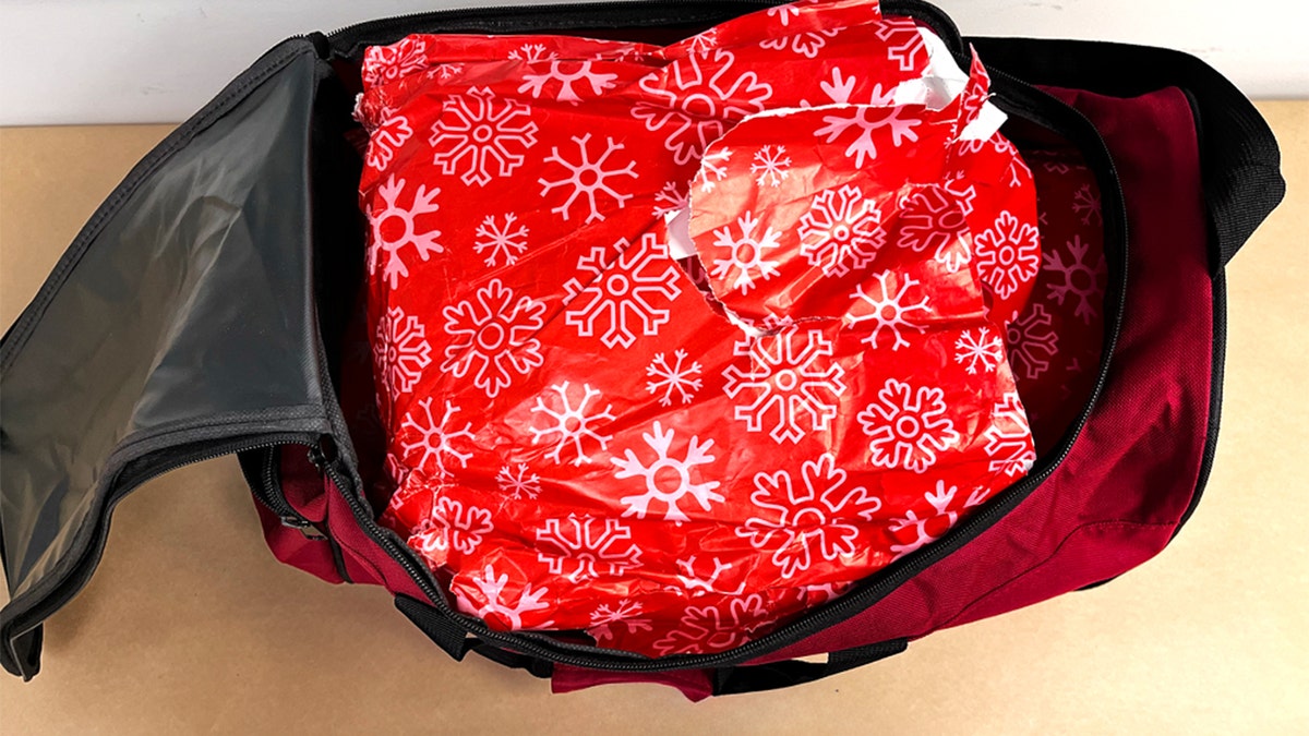 Woman arrested for attempting to smuggle 22 pounds of meth wrapped as Christmas gifts in carry-on bag